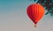 Red balloon in the sky. Aerostat. People in the basket. Fun. Summer entertainment. Romantic adventures. Modern toned photo. Retro