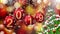 Red balls with numbers 2019 hanging on the background of a gold bokeh and a rotating Christmas tree 3d rendering.