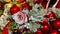 Red balls and roses decorations on christmas tree