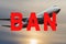 Red ` Ban ` sign on the background of a passenger plane flying in the sky. Concept: closing of air borders, restriction of flights