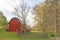 Red barn and circle fence area Springtime