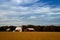 Red Barn in Golden Field