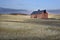 Red barn in a harvested field on the Palouse