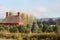 Red Barn, Trees, and Windmill