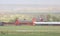 Red Barns In Misty Rain On Sheep Ranch In Colorado