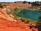 Red bauxite cave and volcanic lake in Otranto, Puglia, Italy
