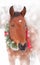 Red bay horse wearing a Christmas wreath