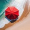 Red Beach Aerial Red Beach Umbrella Atop a Pristine Sandy and Magnificently Top
