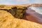 Red beach Playa Roja seashore near Paracas, Ica, Peru, South America