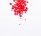 Red beads on white background free space