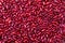 Red beans background. Red beans seeds. Adzuki bean background. Pile of red bean shot from above.