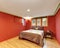 Red bedroom interior design in American bungalow