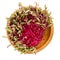 Red beetroot sprouts in wooden bowl over white