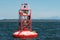 Red bell buoy in inside passage Canada