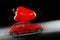 Red bell pepper on model car