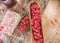 Red berries  with toast on wooden plate at retro concept