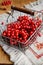 Red berries of viburnum in wire basket