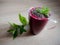 Red berry smoothie with mint leaves