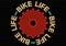 Red bicycle cassette with Bike Life legend over black background