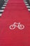 Red Bicycle lane with bike symbol