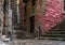 Red bicycle in the street of an old stone little town