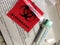Red biohazard label mailer