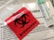 Red biohazard label mailer