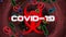 Red biological hazard icon with white word COVID-19 flashing