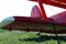 red biplane wing on the ground
