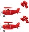 Red biplanes towing balloons.