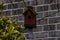 Red Birdhouse in the Garden