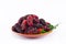 Red and black berry fruit and mulberry leaf in brown bowl on white background healthy mulberry fruit food