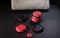 Red and black holistic medicine or alternative medicine biomagnetism magnets placed on a health therapy stretcher