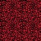 Red on black leopard print seamless repeat pattern background