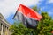 Red black patriotic Ukrainian flag with the inscription in Ukrainian - Right Sector and coat of arms of Ukraine waving. National