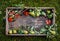 Red and black Rowan with pear branches and autumn leaves on a textured old wooden surface