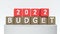 Red Blocks With number 2022 and BUDGET. New year concept. Copy space. 3d