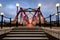 Red and blue cast iron bridge and steps at Salford