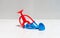 Red and Blue figure toy in fighting action