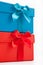 Red and blue gifts with ornamental bows