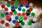 Red, blue, green and black casino tokens