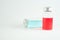 Red and blue liquid in injection vials