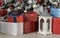 Red with blue ribbon Gift boxes and white lantern under decorated Christmas tree