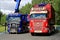 Red and Blue Scania Trucks on Display