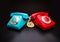 Red and blue telephones