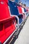 Red, blue and white grandstand seats