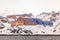 Red, blue and yellow living houses on the rocky hills of Sisimiut the 2nd largest Greenlandic city