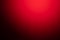 Red blurred background with strong black gradient and vignette