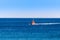 Red boat in Ebro Delta nature park, Tarragona, Catalunya, Spain. Copy space for text.