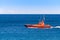 Red boat in Ebro Delta nature park, Tarragona, Catalunya, Spain. Copy space for text.